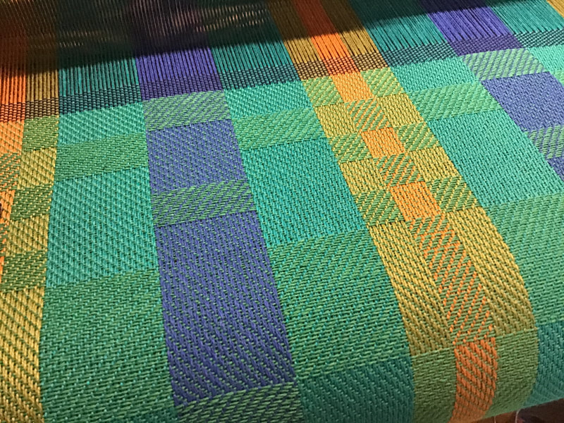 Janice Jones- Brightly colored cotton towel on loom