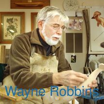 Wayne Robbins carving wood bird